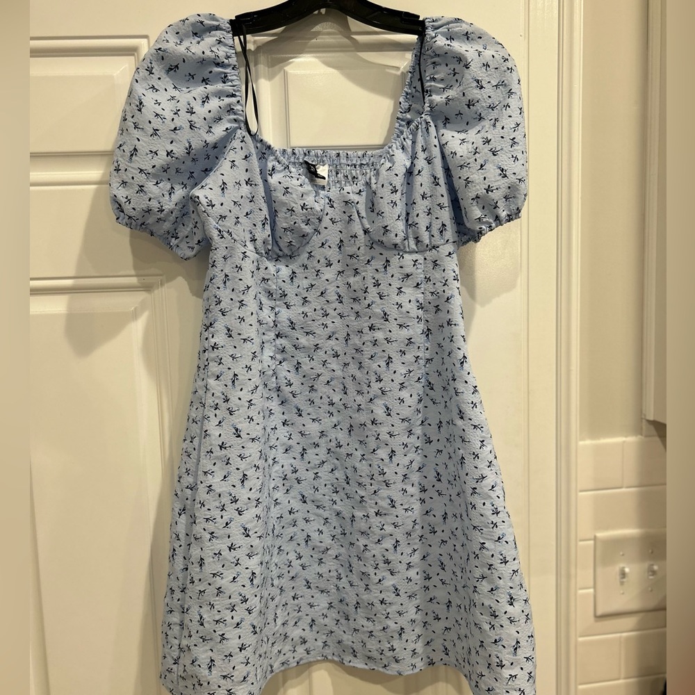 Blue baby doll dress with floral details